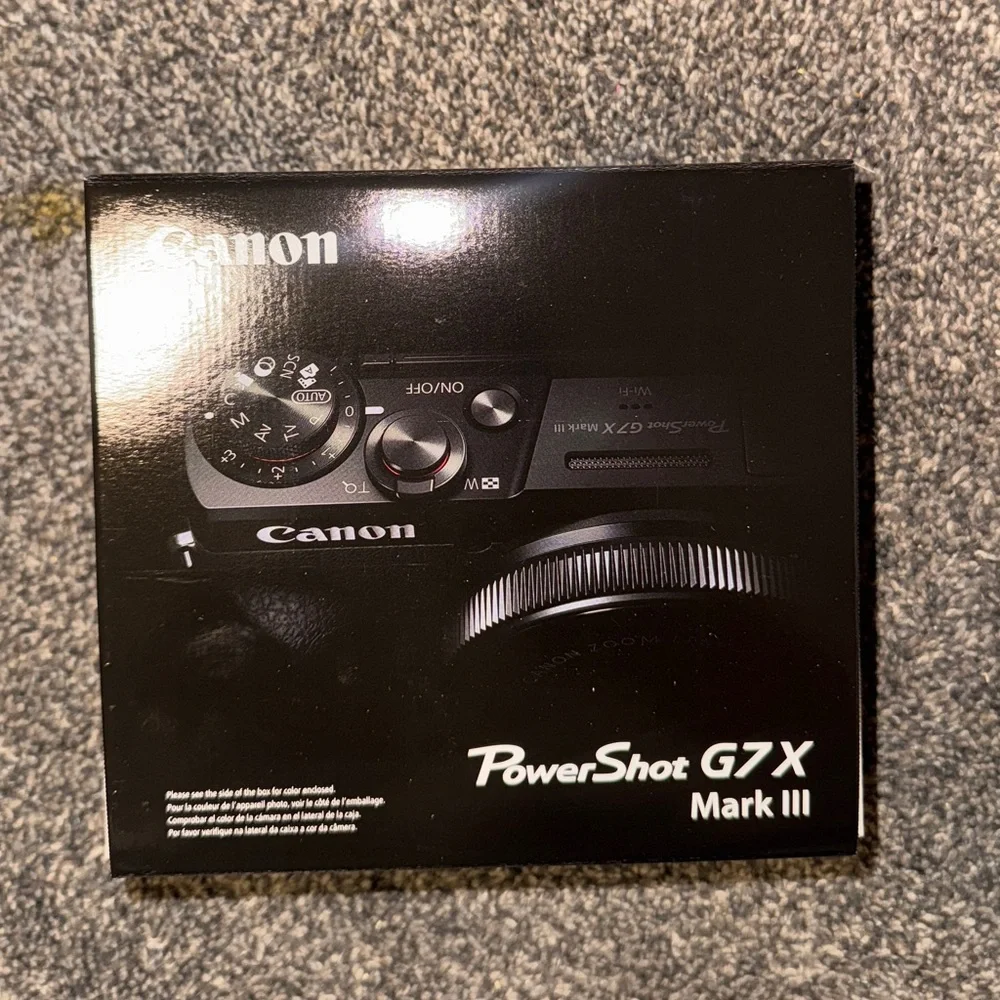 Canon G7X iii with pink cover and a black case